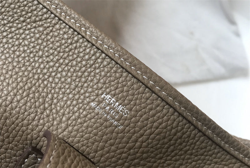 Side view of elegant structured handbag