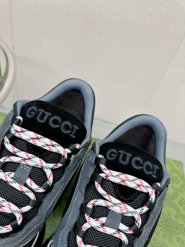 Gucci sneakers detailed view showing premium designer craftsmanship