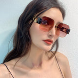Close-up detail view of Louis Vuitton unisex sunglasses