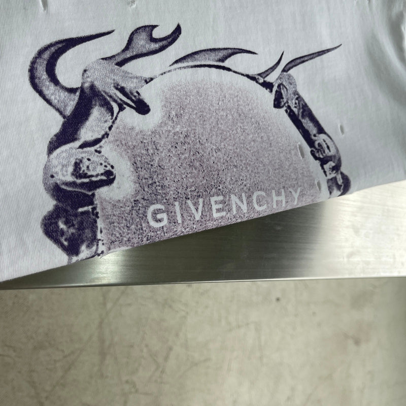 Flat lay presentation of Givenchy luxury clothing with contemporary cut