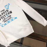 Front view of Louis Vuitton luxury clothing with tailored silhouette