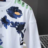 Full styled look of Louis Vuitton cotton t-shirt with signature branding