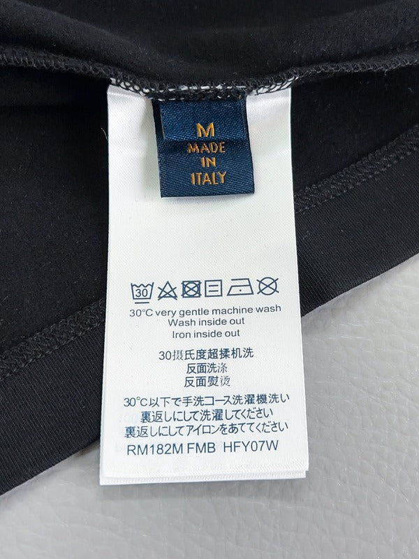 Close-up detail shot of Louis Vuitton luxury clothing with everyday silhouette
