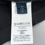 Close-up detail shot of Louis Vuitton luxury clothing with everyday silhouette