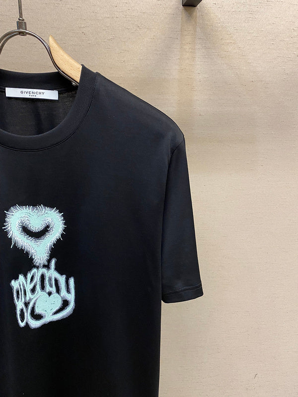 Flat lay presentation of Givenchy luxury clothing with contemporary cut