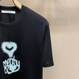 Flat lay presentation of Givenchy luxury clothing with contemporary cut