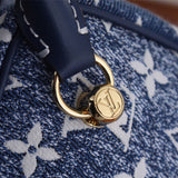  understated top-handle bag styled with outfit
