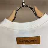 Close-up detail shot of Louis Vuitton cotton t-shirt with signature branding