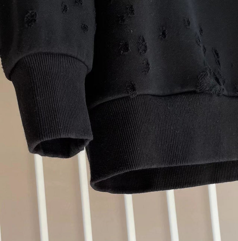 Flat lay presentation of Givenchy luxury clothing with logo-detail design