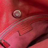 Side profile of sleek statement women's handbag – women's luxury handbag