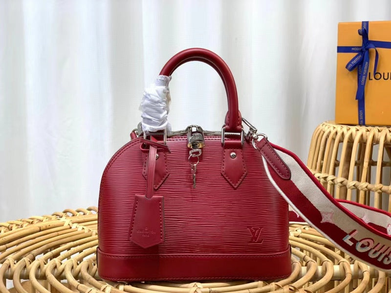 Front view of polished classic women's handbag – women's statement bag