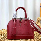 Front view of polished classic women's handbag – women's statement bag