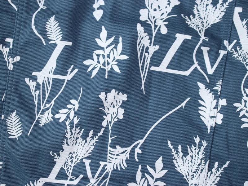 Side profile of Louis Vuitton luxury clothing with signature branding