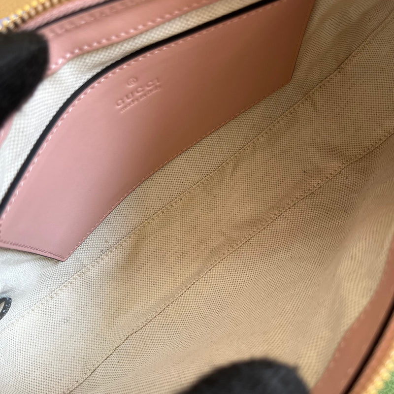 Side view of minimalist structured handbag
