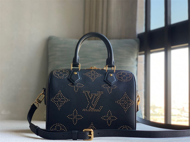  Refined top-handle bag carried on shoulder