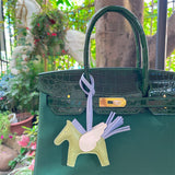  Signature handbag carried on shoulder