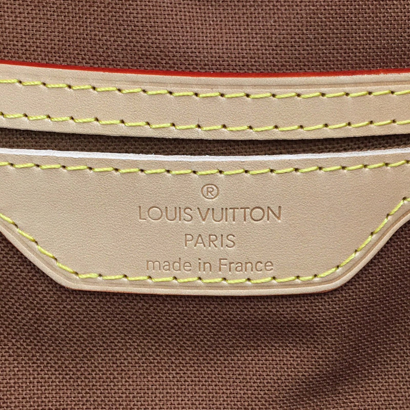 Handle and strap detail of polished chic women's handbag – women's everyday handbag