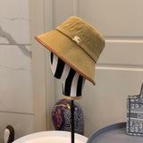 Close-up detail view of Burberry unisex cap