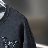 Full styled look of Louis Vuitton luxury clothing with relaxed-fit cut