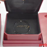 Side view of Cartier unisex jewelry piece
