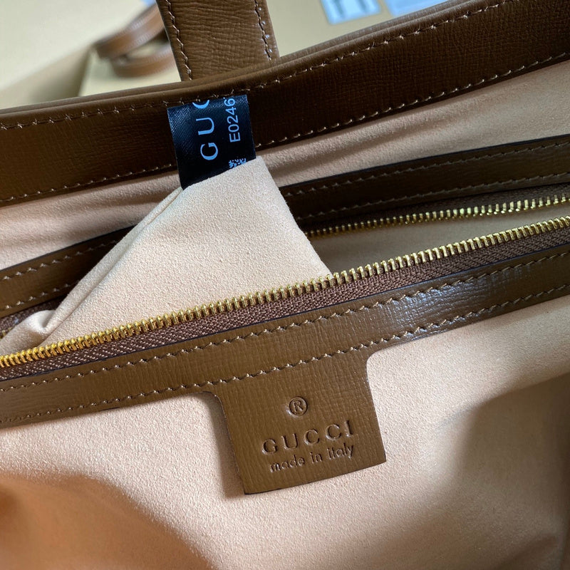 Side profile of everyday-luxe statement women's handbag – women's luxury handbag