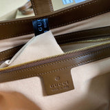 Side profile of everyday-luxe statement women's handbag – women's luxury handbag