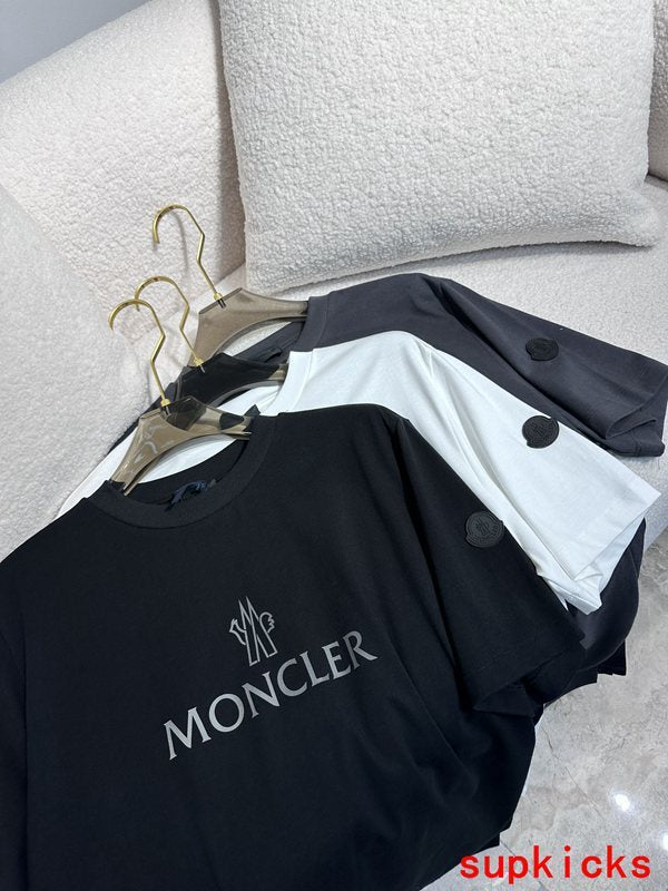 Front view of Moncler luxury clothing with monogram-inspired silhouette