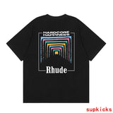 Flat lay presentation of Rhude luxury clothing with monogram-inspired silhouette