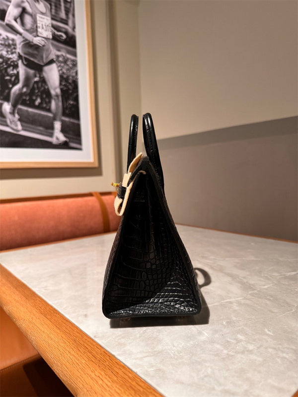 Side view of contemporary structured handbag