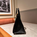 Side view of contemporary structured handbag
