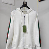 Front view of Gucci luxury clothing with label-forward styling