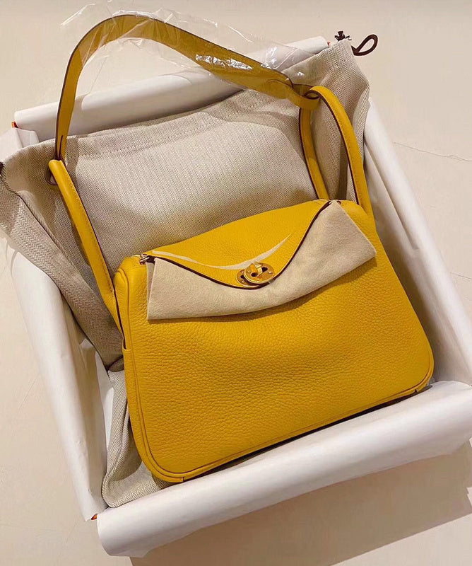 Side view of timeless structured handbag