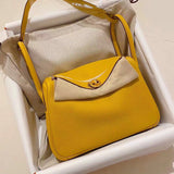 Side view of timeless structured handbag