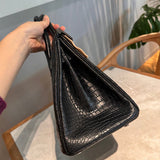 Side view of modern structured handbag