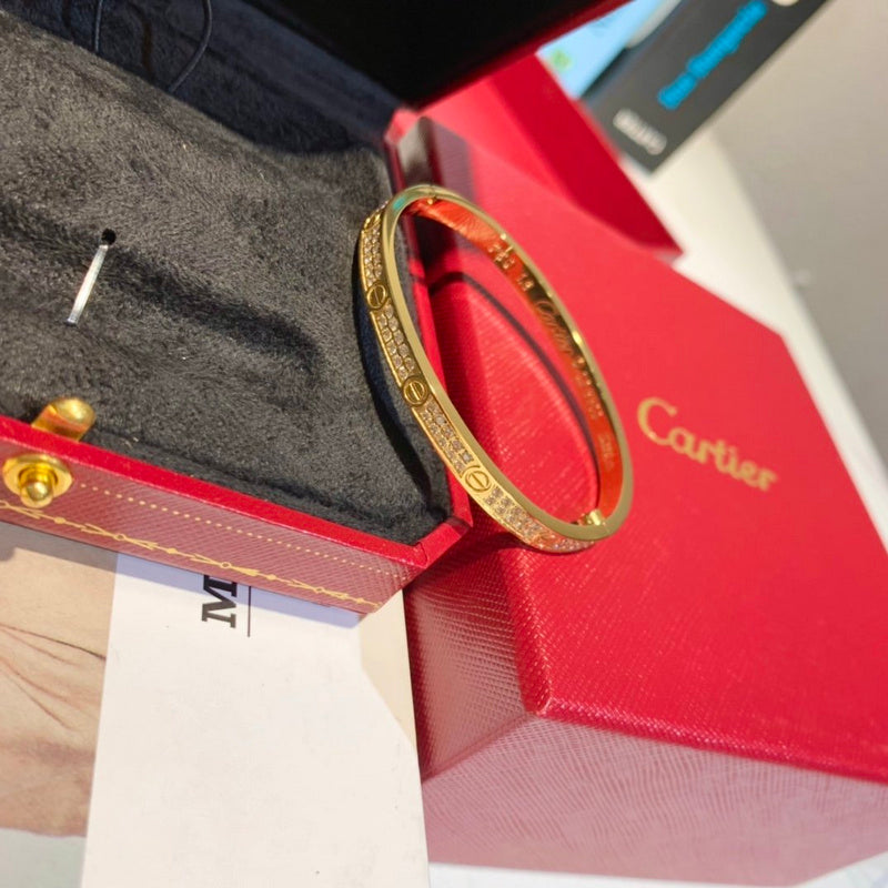 Angled view of Cartier unisex jewelry piece
