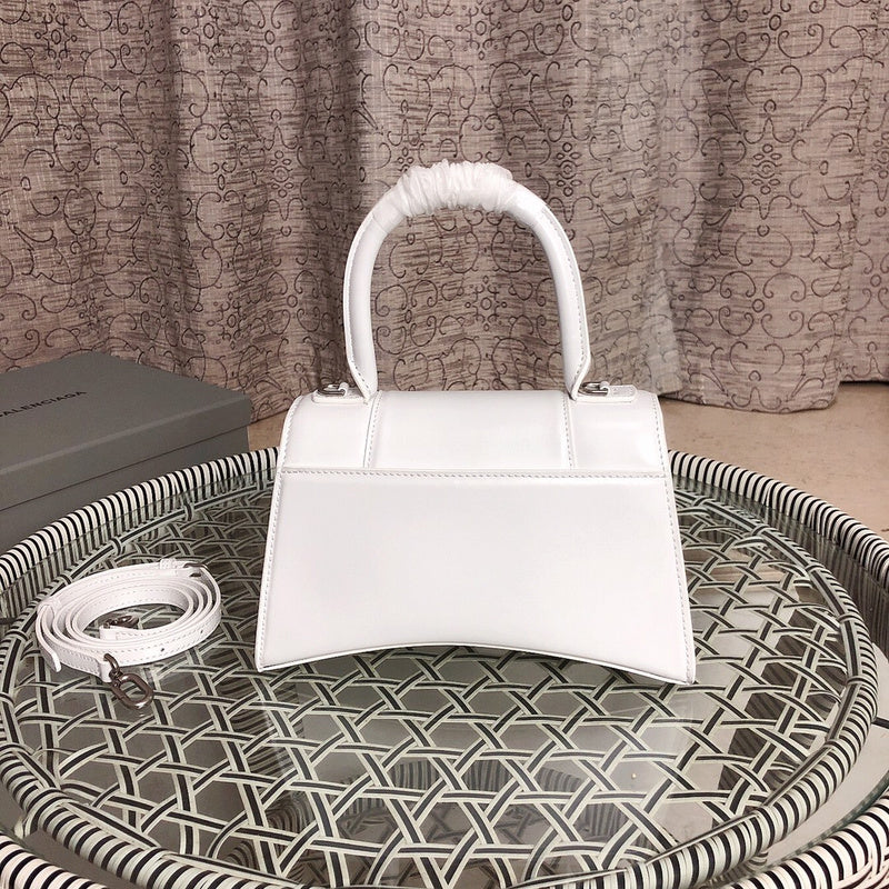 Styled lifestyle shot of premium refined women's handbag – women's statement bag