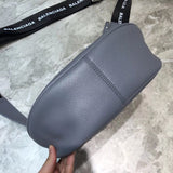 Sleek Premium PU Leather Handbag - Statement Silhouette | Women's Premium Handbag #746 - back view (image 4) of designer-inspired handbag