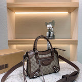 Ziva's Charm handbag – close-up view (one versatile size)
