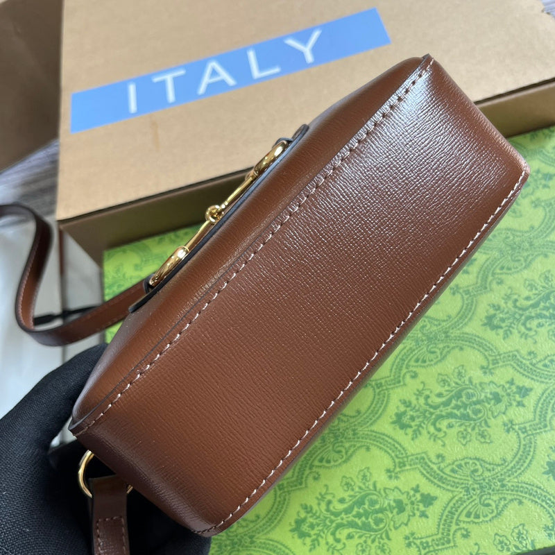 Styled lifestyle shot of refined signature women's handbag – women's designer-style accessory