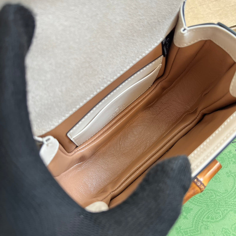 Side view of structured structured handbag