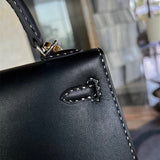 Side view of contemporary structured handbag