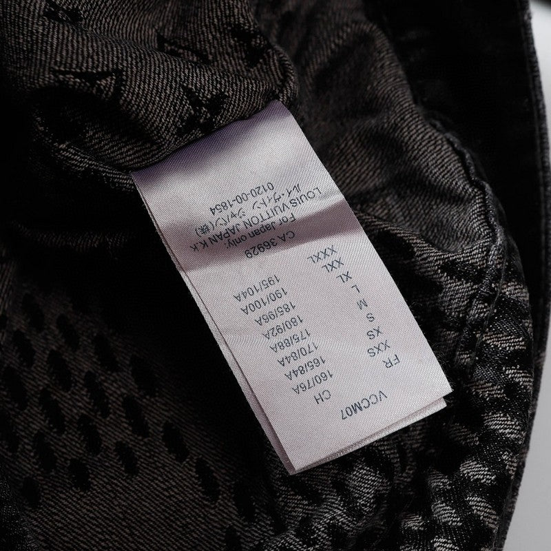 Flat lay presentation of Louis Vuitton luxury clothing with relaxed-fit cut