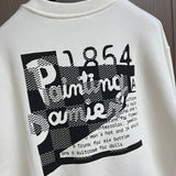 Side profile of Louis Vuitton luxury clothing with signature branding