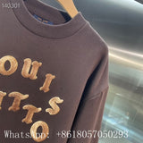 Close-up detail shot of Louis Vuitton luxury clothing with runway-inspired design