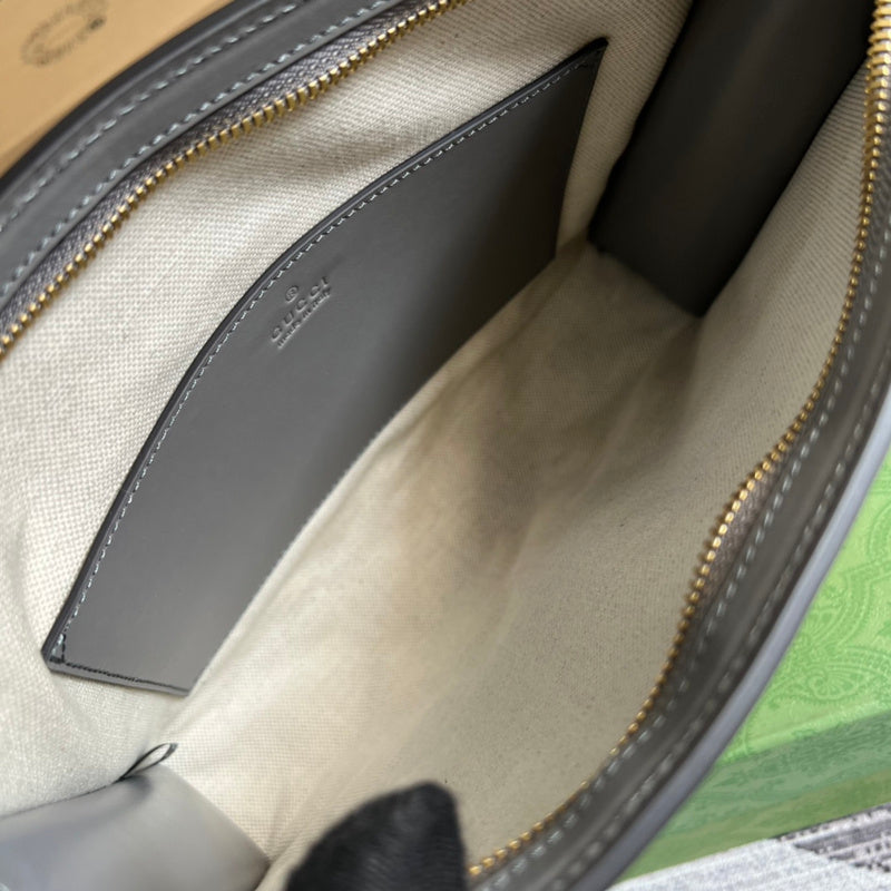 Side view of sleek structured handbag