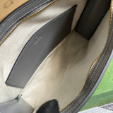 Side view of sleek structured handbag