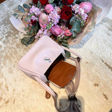 Side view of contemporary structured handbag