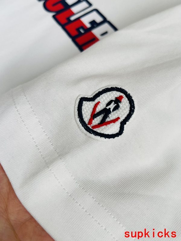 Back view of Moncler luxury clothing with contemporary cut