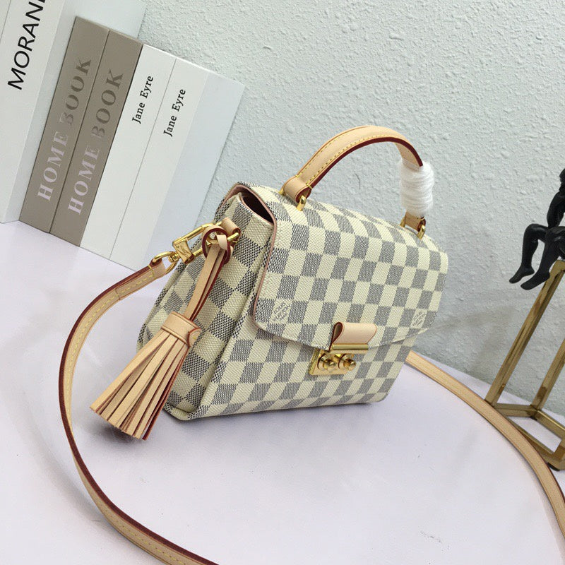 Close-up detail of elevated modern women's handbag – women's luxury accessory