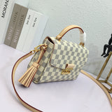 Close-up detail of elevated modern women's handbag – women's luxury accessory